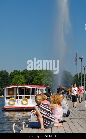 People on the Alster Lake steamer quay in Hamburg, Germany, Europe Stock Photo