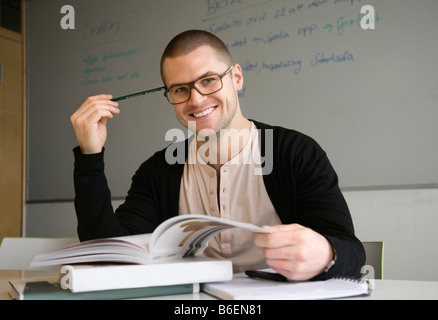 Happy guy studying Stock Photo