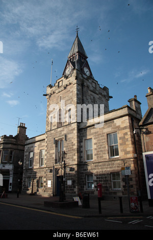 Birds circle around the courthouse Main St Nairn Invernesshire Highland Scotland Stock Photo