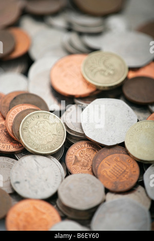 A large pile of various British, sterling coins Stock Photo