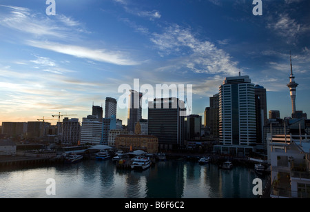 Skyline of the central business district at dawn, Auckland, New Zealand viewed from Princes Wharf. Stock Photo