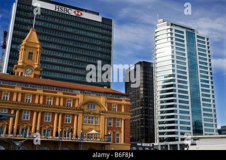 The Auckland Ferry Building surrounded by the central business district, Auckland, New Zealand Stock Photo