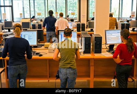 Students using computers for research at the Eberhard-Karls University Library in Tuebingen, Baden-Wuerttemberg, Germany, Europe Stock Photo