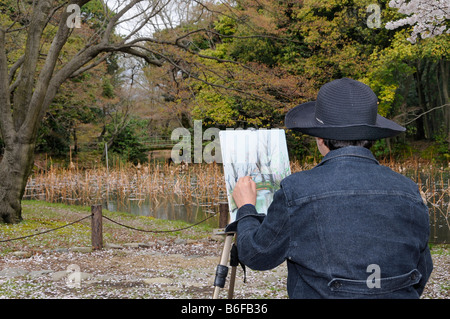 Japanese amateur painter in the botanical gardens in Kyoto, Japan, Asia Stock Photo