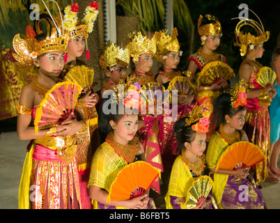 Balinese children present the traditional Legong dance to tourists in Kuta, Bali, Indonesia, Asia Stock Photo