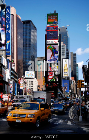 Traffic and yellow cabs in Times Square, New York City, NY, USA Stock Photo