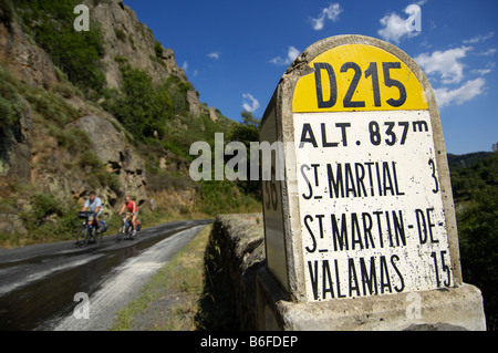 Information on distances, cyclists near Saint Martial, Ardèche, Rhones-Alpes, France, Europe Stock Photo