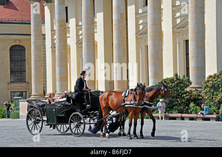 Horse drawn carriage on the Gendarmenmarkt in Berlin, Germany, Europe Stock Photo