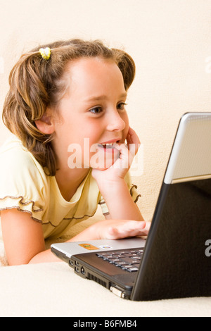 Girl, 6 years old, with notebook Stock Photo