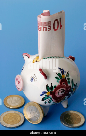 Euros and piggy bank Stock Photo
