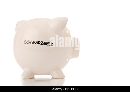 Piggy bank printed with the word, Schwarzgeld or black money Stock Photo
