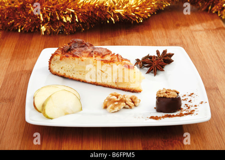 Christmas apple pie with fresh apples, cinnamon and walnuts Stock Photo