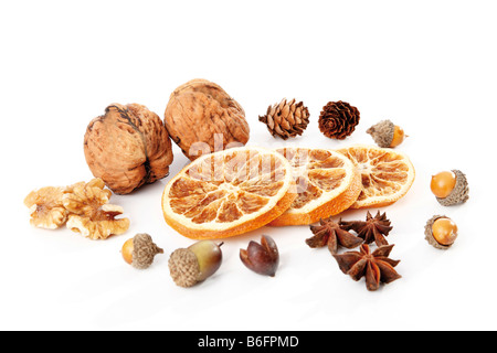 Christmas decoration, dried slices of orange, anise seeds, nuts Stock Photo