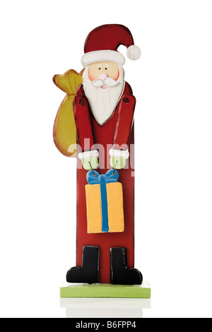 Santa Claus standing up on white background with his bag full of gifts ...