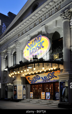 Palladium Theatre main entrance and floodlit façade at night Sound of Music stage show production London West End England UK Stock Photo