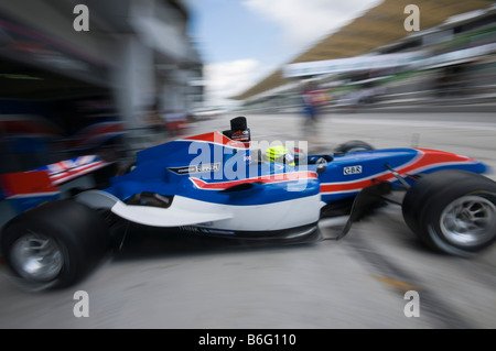 Motion blur of Danny Watts of A1 Team Great Britain steers his car during practice session at A1GP World Cup of Motorsport Stock Photo