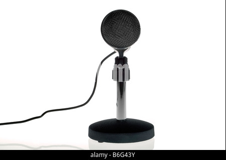 View of a black microphone on a table stand isolated on a white background Stock Photo