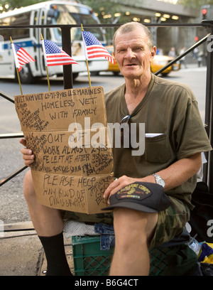 Vietnam war veteran casualty begs for money on 5th Avenue at Rockefeller Center in NYC in 2008 Stock Photo