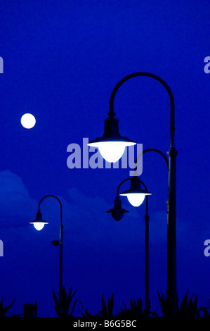Street lamps at dusk. Stock Photo