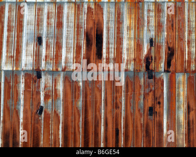 Rusty metal wall of equipment shed. Stock Photo