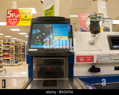 Self service check out till with plastic carrier bags in Fry's food ...