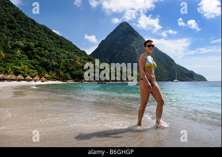 A HOLIDAYMAKER ON FORBIDDEN BEACH WITH A VIEW OF GROS PITON AT THE JALOUSIE PLANTATION RESORT ST LUCIA Stock Photo