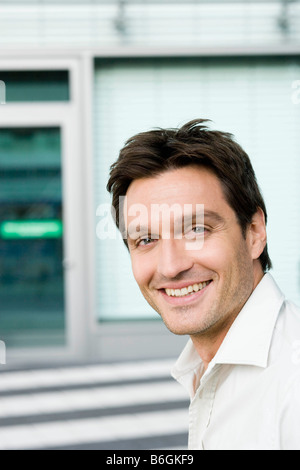 Man smiling at viewer Stock Photo