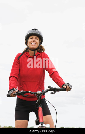 Woman cyclist on bicycle