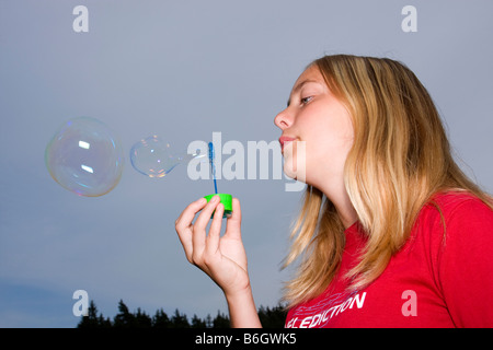 Girl 13 years old with bubbles Stock Photo