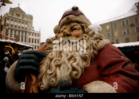 A Santa Claus figure at the Christkindl Markt (Advent or Christmas Market) in Augsburg, Germany. Stock Photo