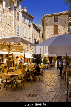French cafe bar restaurants in the square in the old town of Vence, Cote D'Azur, Provence, France, South of France Stock Photo