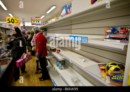empty shelves in a branch of Woolworths during the closing down sale in the store december 11 2008 Stock Photo