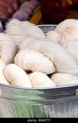 Skeins of white wool yarn. Stock Photo