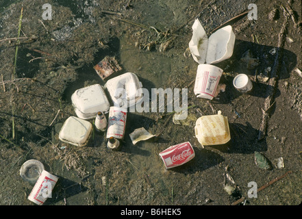 Fast food containers beer cans soda cans and other trash pollute the banks of the Pecos River near Carlsbad New Mexico Stock Photo