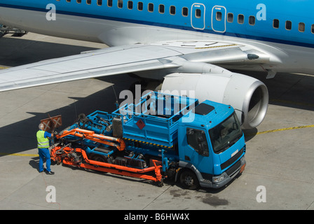 refuelling a plane on the airport Stock Photo