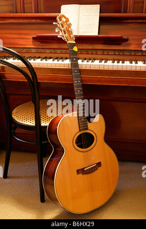 Individually designed flat top acoustic guitar with oval sound hole and ...