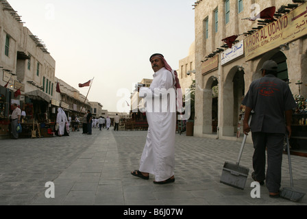 Qatari man in traditional attire at the Souq Waqif market in Doha, Qatar. Stock Photo