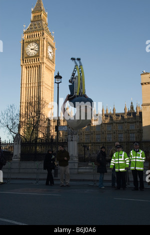 young poweriser performs in Parliament Square London in front of Big Ben Stock Photo