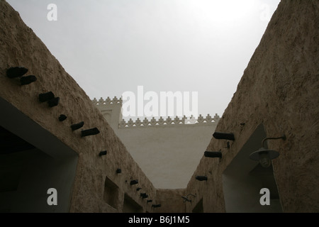 Traditional buildings with protruding 'shandal' beams in Doha, Qatar, Middle East Stock Photo