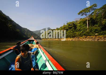 Traveling by boat on the Rio Alto Urubamba in the Amazon region of Peru. Stock Photo