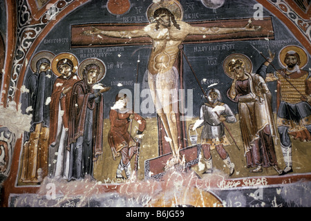 Wall paintings of Crucifixion in the Dark Church Goreme Cappodicia Turkey Asia Dark Church Karanlik Kilise so named for the Stock Photo