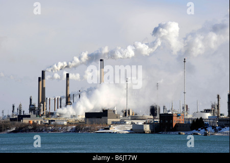 Serious air pollution from the chemical valley in sarnia ontario canada bordering the united states at port huron michigan Stock Photo
