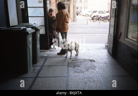 Two woman (and dog) chat on the street Zagreb Croatia Stock Photo