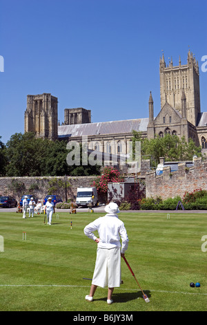 England, Somerset, Wells. England, Somerset, Wells. A game of croquet takes place on the lawns in front of the Bishops Palace Stock Photo