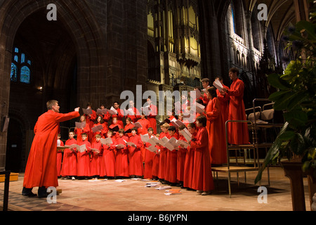 UK Cheshire Chester Cathedral Choir rehearsing for Christmas Carol Concert Stock Photo