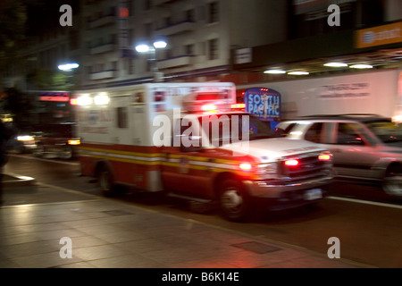 Ambulance in motion at night in Manhattan New York City New York USA Stock Photo