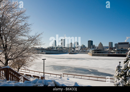 View of  Montreal in the Winter with the St Lawrence river in the foreground Stock Photo