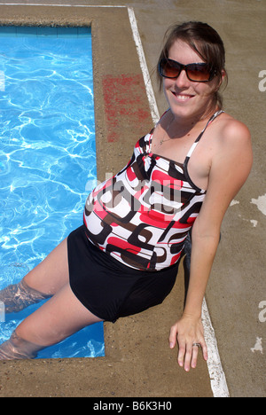 Pregnant woman by  Swimming Pool Stock Photo