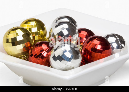 Close-up of baubles in a bowl Stock Photo