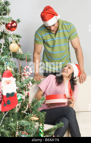 Couple celebrating a Christmas festival Stock Photo